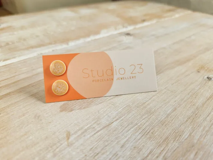 studio__circle_stud_earri_0-2.webp Studio 23 Circle Stud Earring Pair Orange